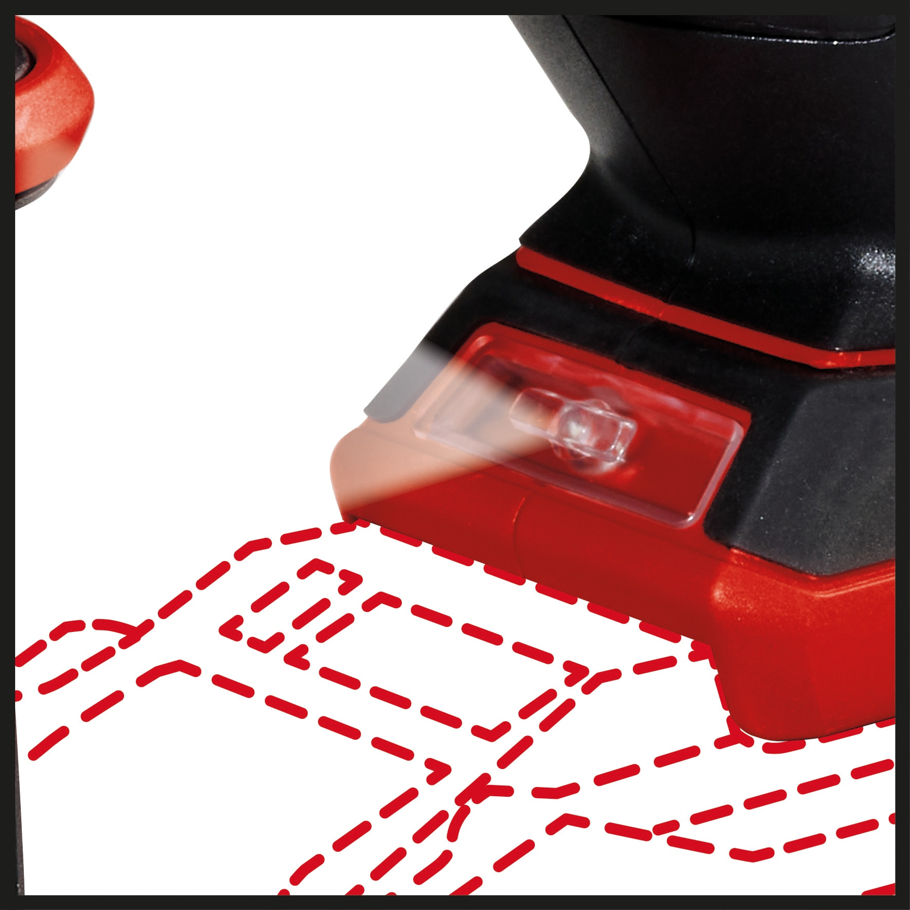 Zbliżenie czerwono-czarnego elektronarzędzia, pokazujące czerwone światło i przerywane linie.