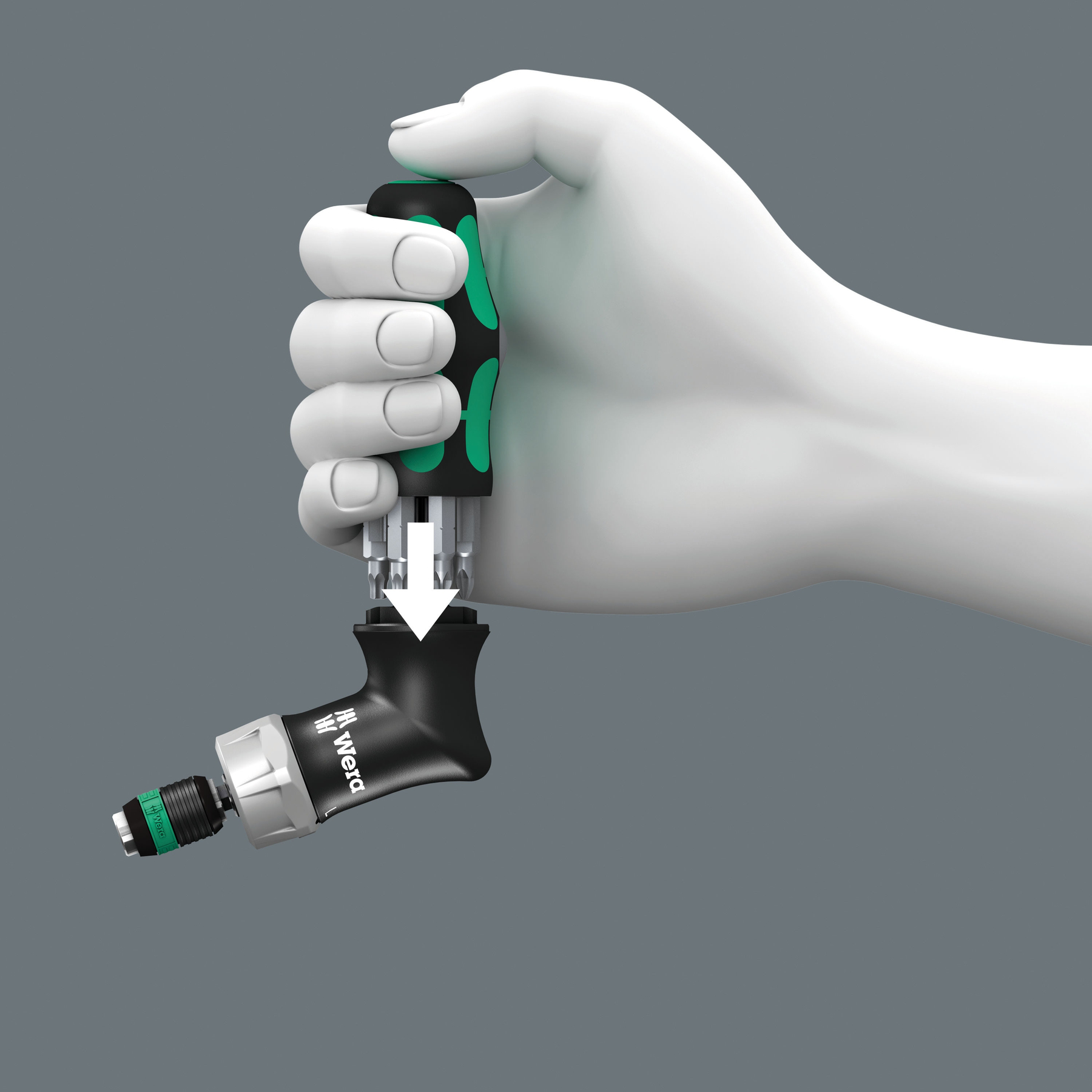 Ręka trzyma śrubokręt, z wkładanym wymiennym bitem. Widoczne jest logo Wera.