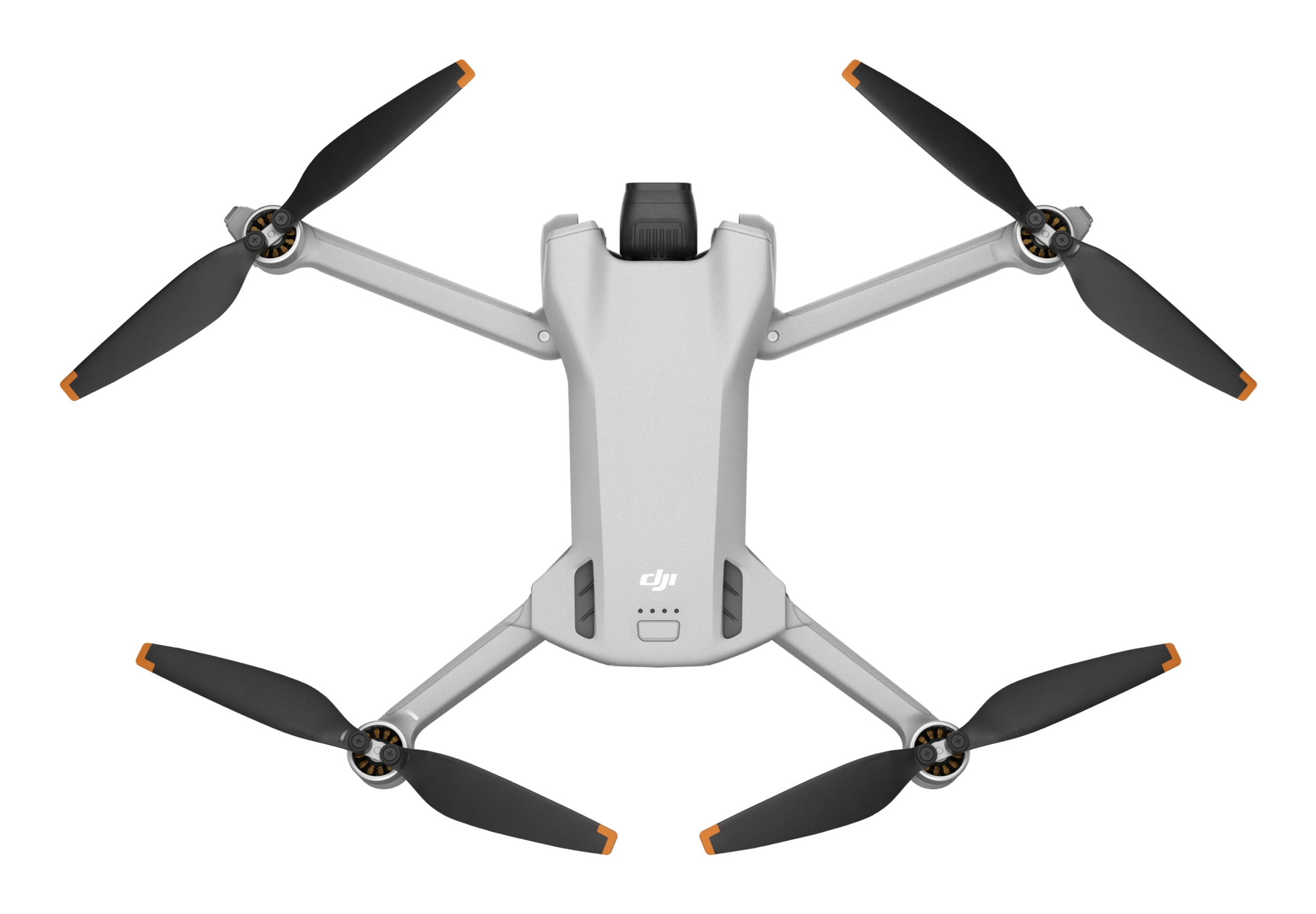 Dron z czterema czarnymi śmigłami, widok z góry, z napisem „dji” na górze.