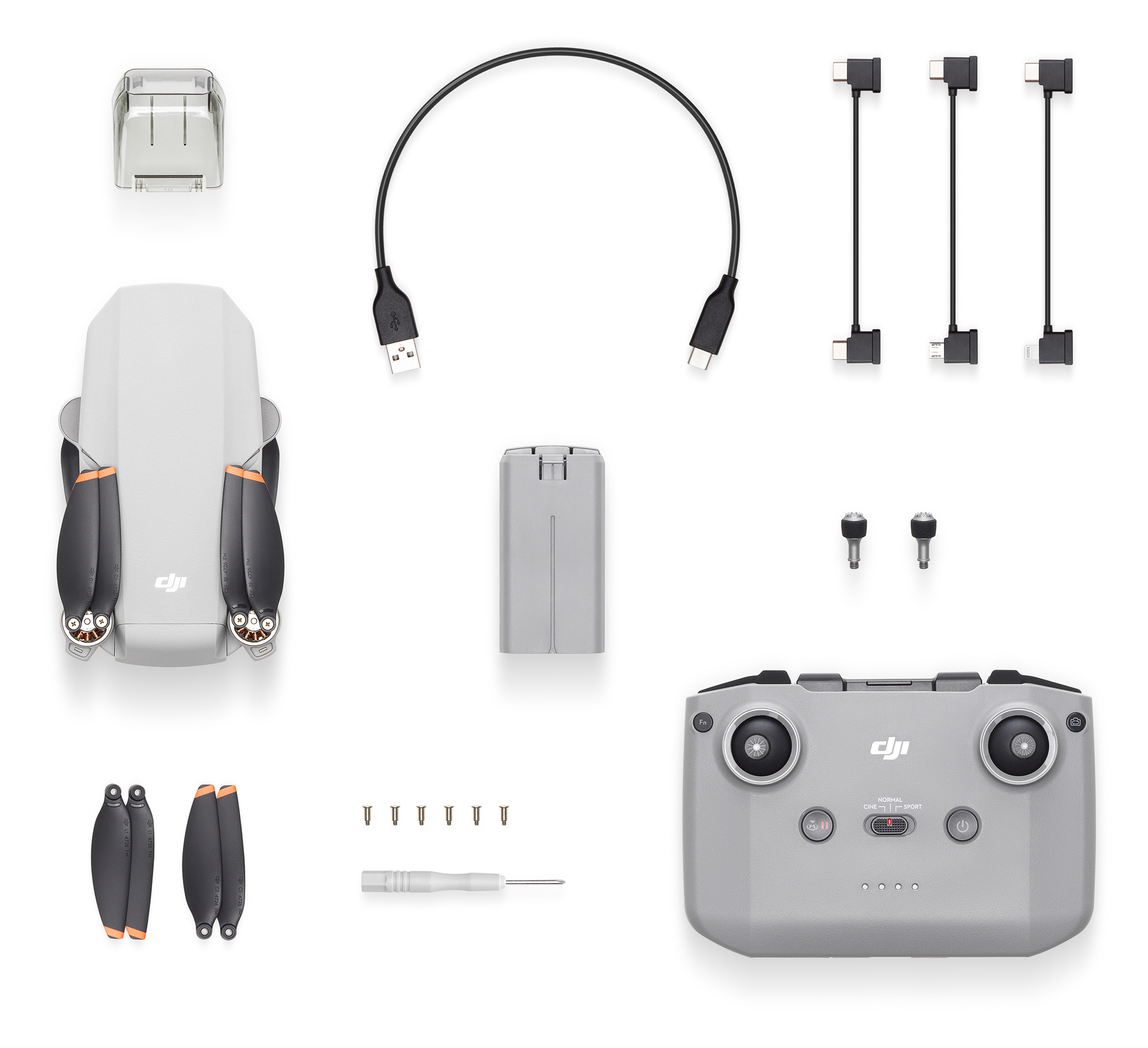 DJI Drohnen-Kit mit Drohne, Controller, Akku, Propellern und Zubehör.