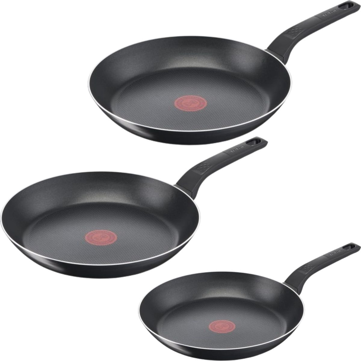 Ensemble de trois poêles noires avec des cercles rouges au centre.