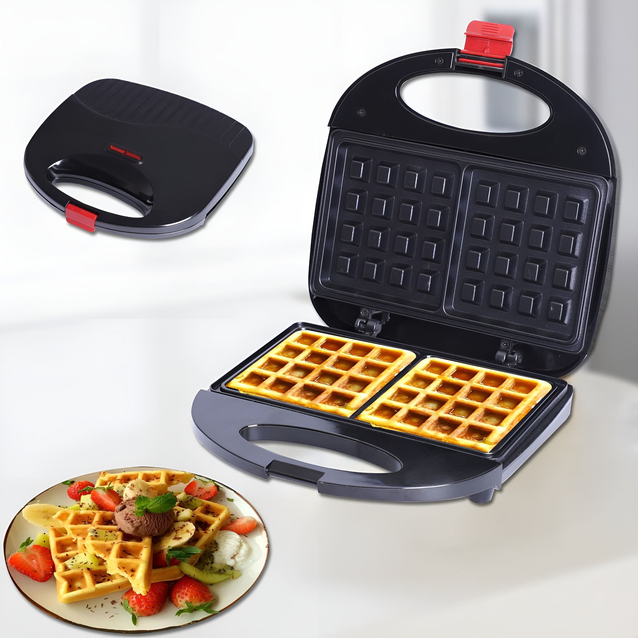 Waffeleisen mit Waffeln und ein Teller Waffeln mit Früchten.