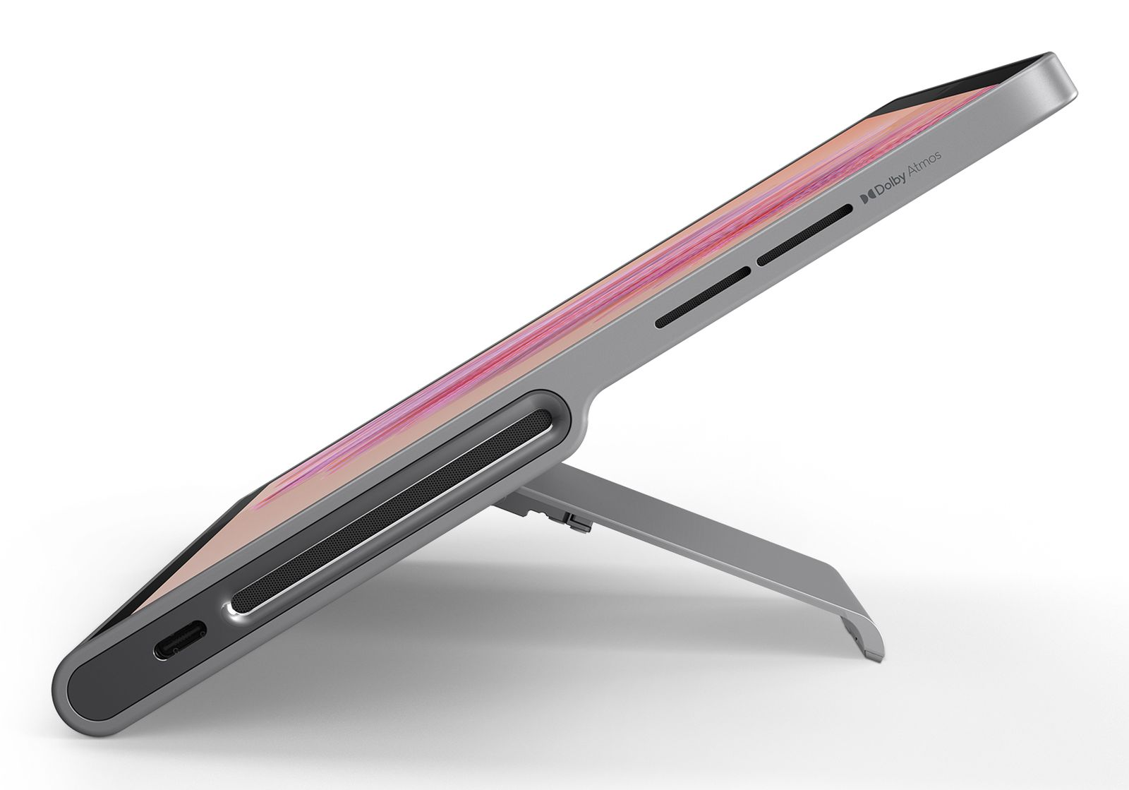 Srebrny tablet, pod kątem, z różowym ekranem i srebrną podstawką.