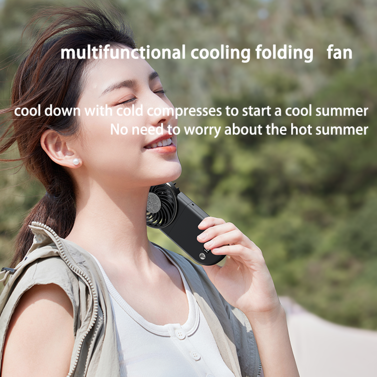 Woman using a black folding fan. Product description is visible.