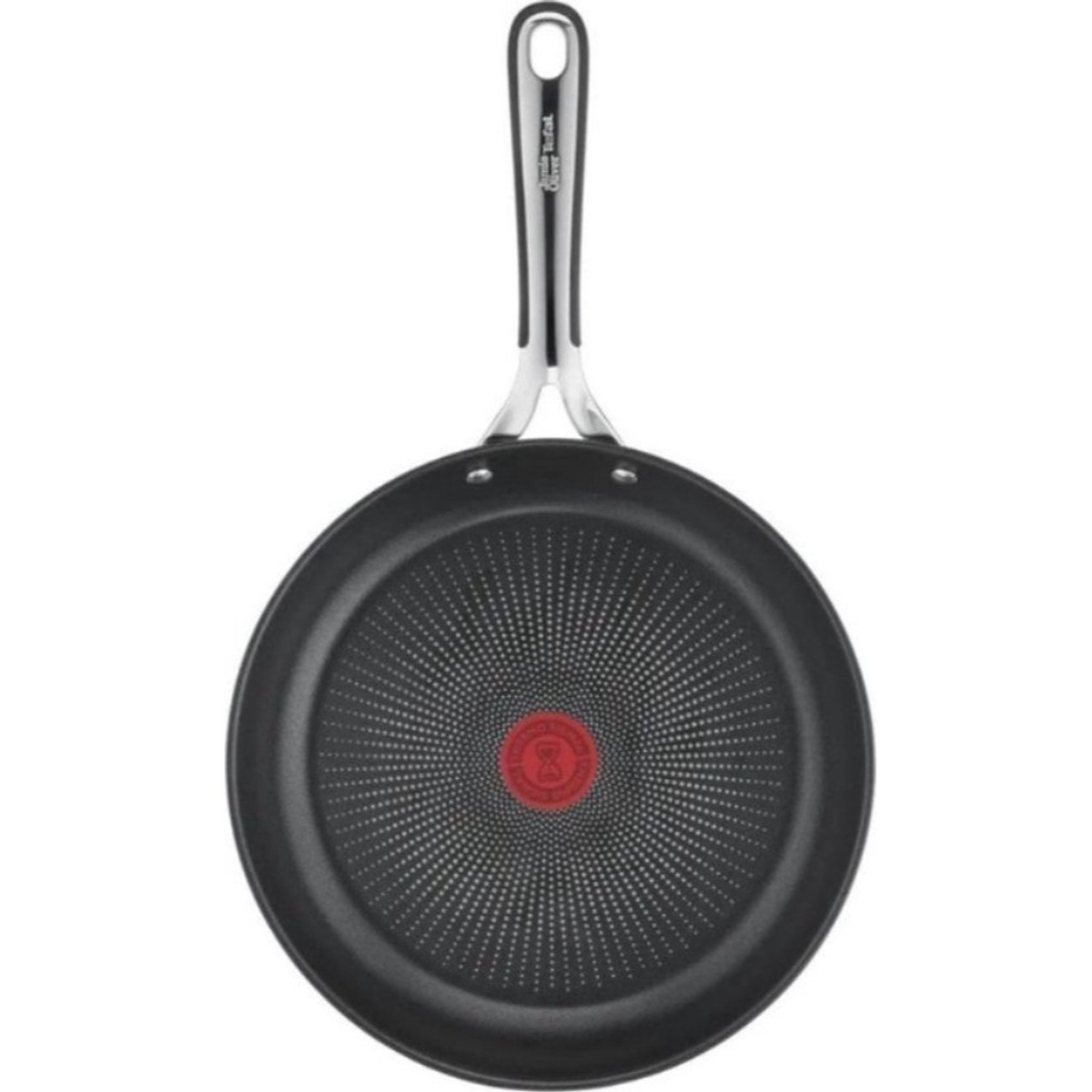 Poêle noire avec cercle rouge au centre. Manche en acier inoxydable avec logo Tefal.