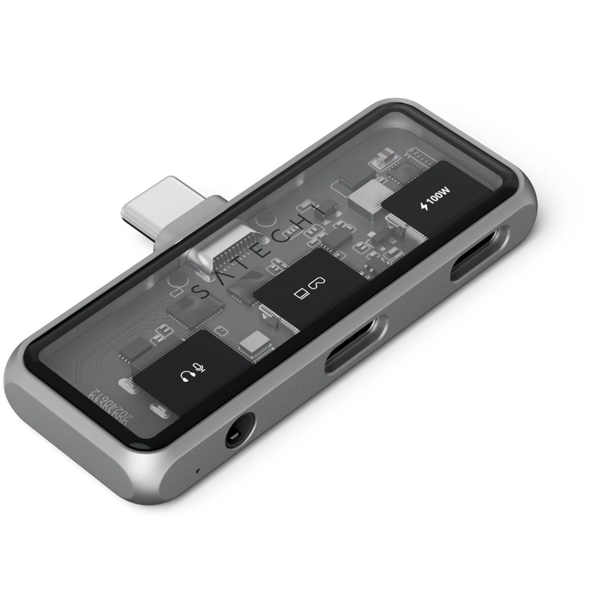 Silberner Adapter mit mehreren Anschlüssen, darunter USB-C und Kopfhöreranschluss, auf weißer Oberfläche.