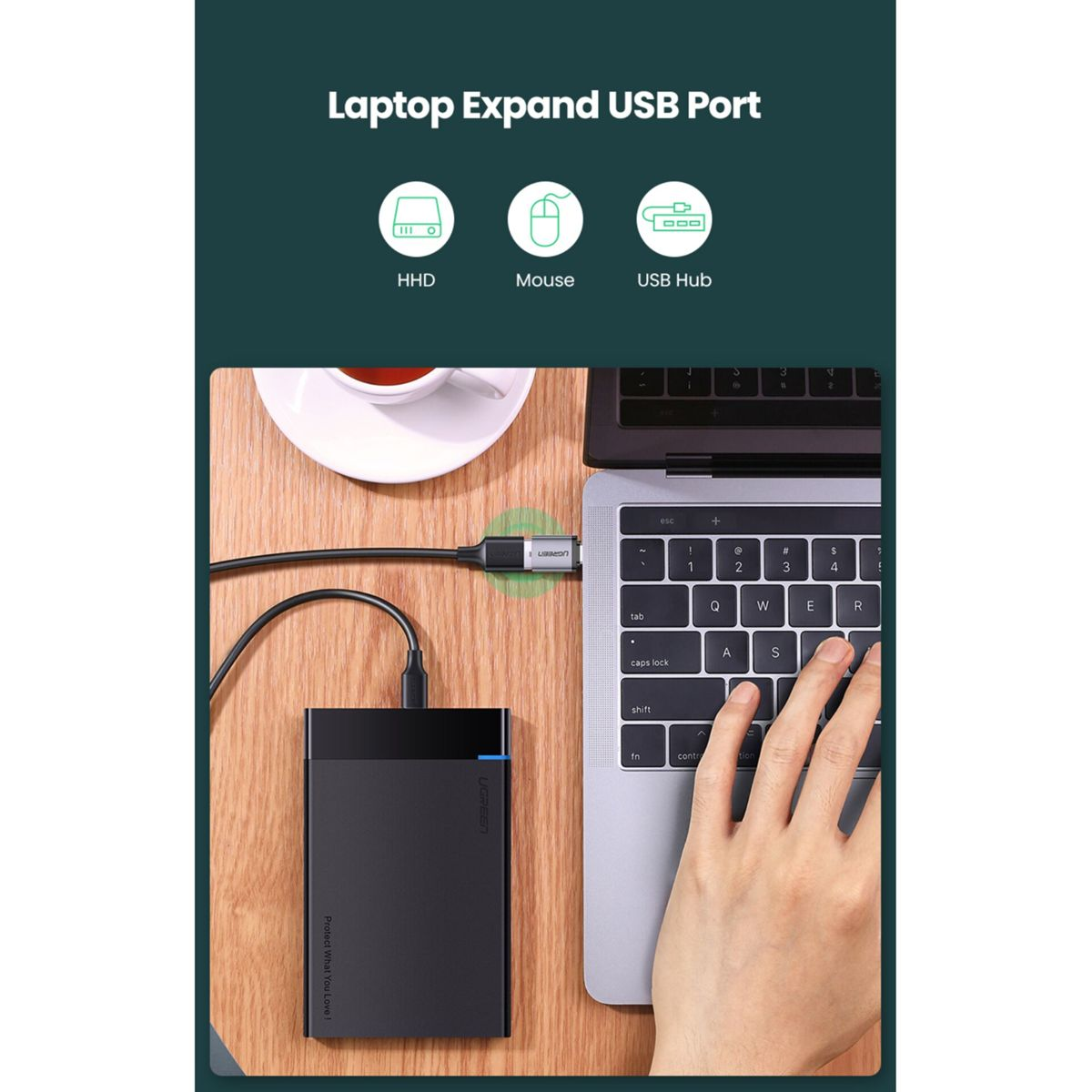 Czarny dysk twardy podłączony do laptopa. Tekst: Rozszerz port USB laptopa. HHD, Mysz, Hub USB.
