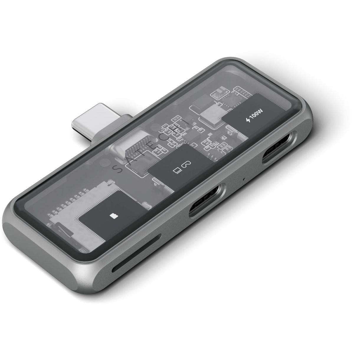 Hub USB-C argentato con più porte, che mostra i componenti interni, con una copertura in plastica trasparente.