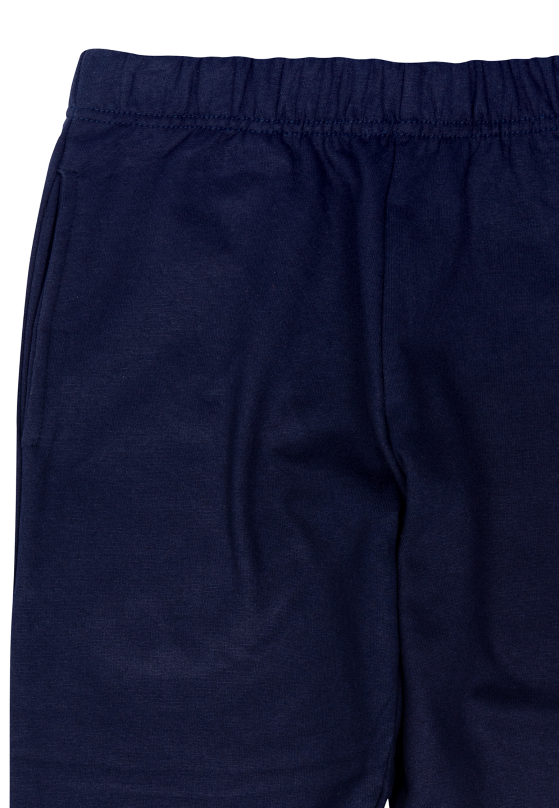 Nahaufnahme einer marineblauen Jogginghose. Einfacher Stoff, Fokus auf dem Bein.