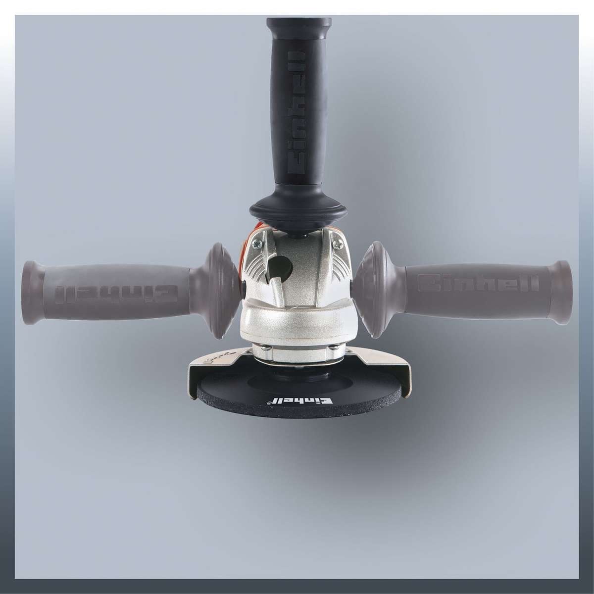 Szlifierka kątowa z trzema uchwytami na szarym tle.