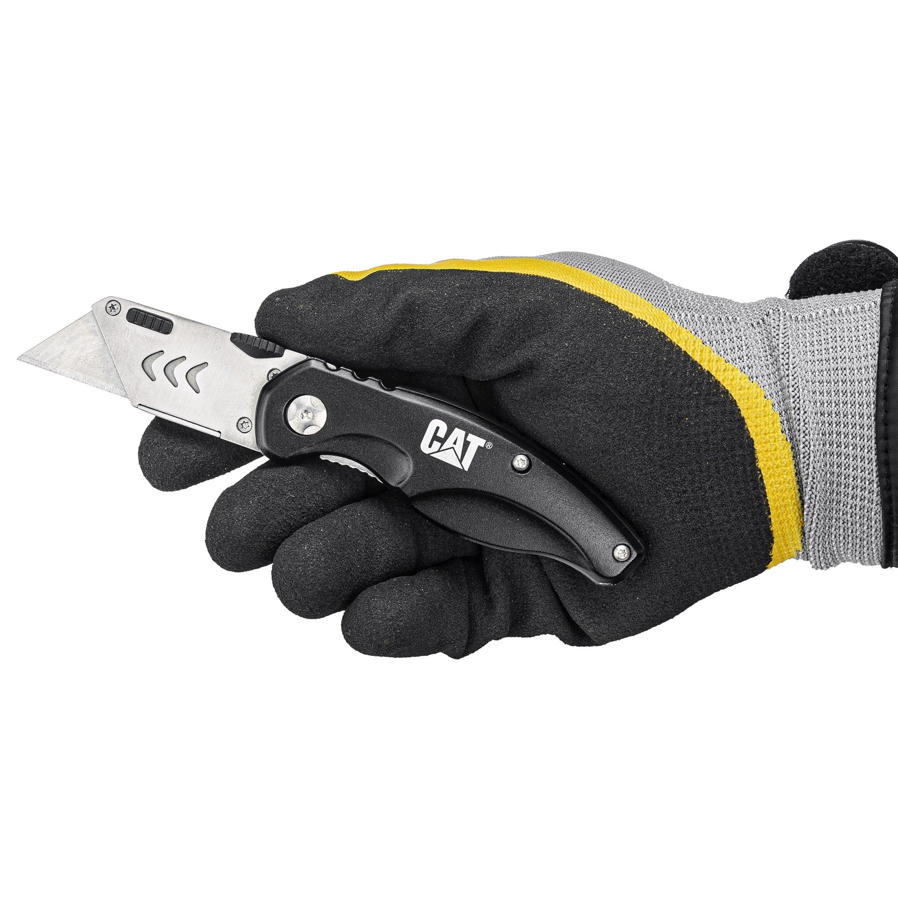 Dłoń w rękawicy trzymająca nóż do tapet CAT.