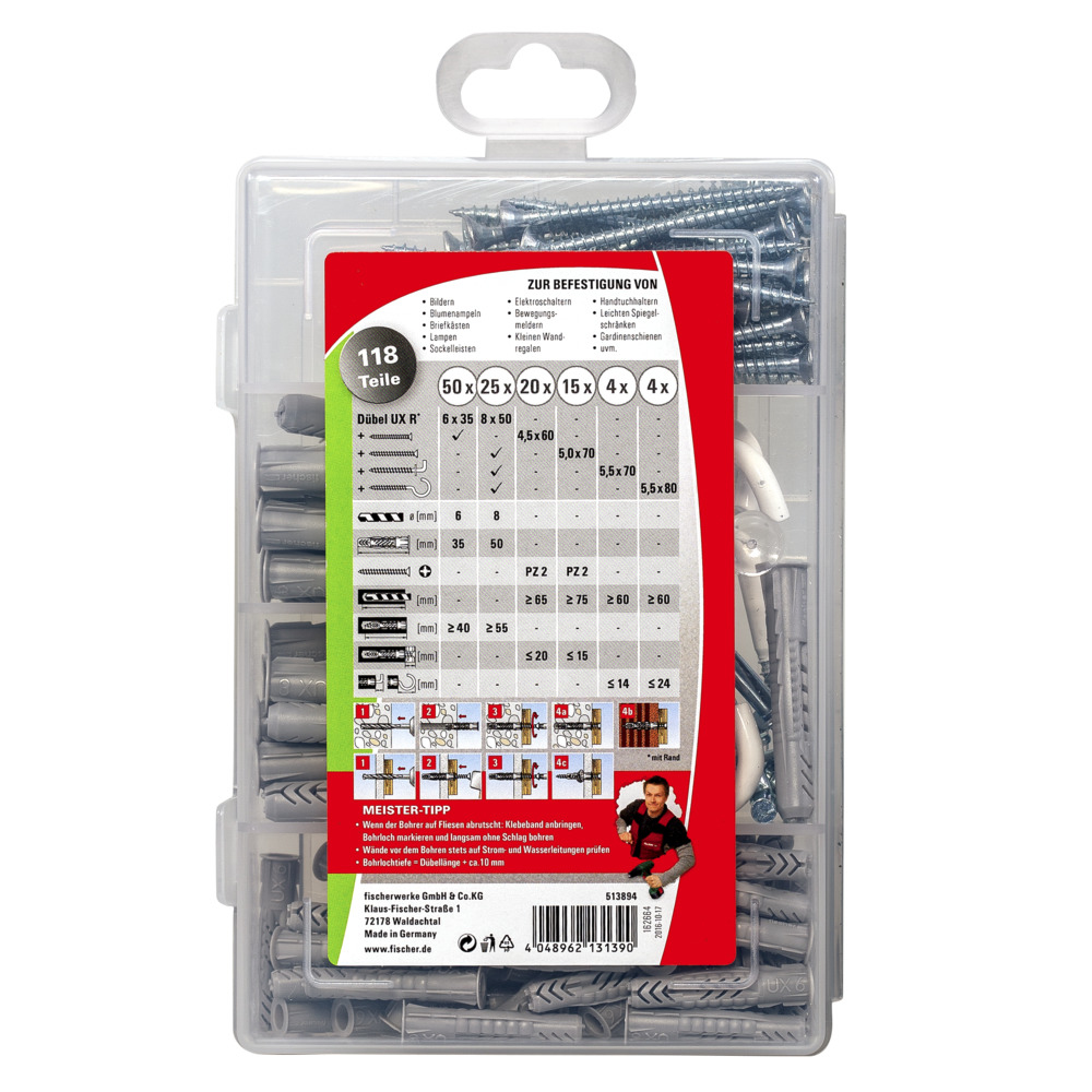 Een doorzichtige plastic doos gevuld met diverse schroeven en pluggen. Witte achtergrond.