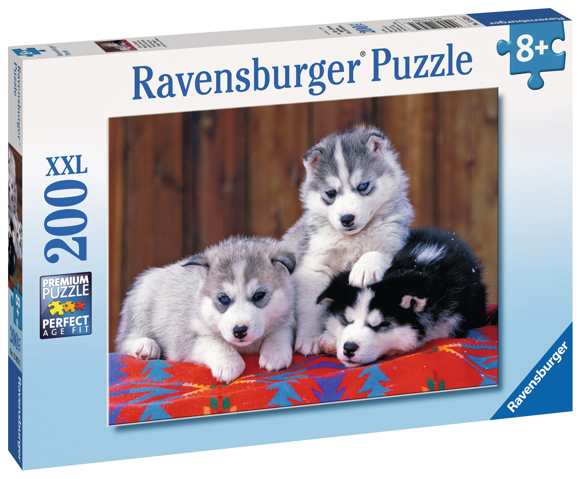 Pudełko z puzzlami z trzema szczeniakami husky. Na pudełku jest napisane 200 elementów.