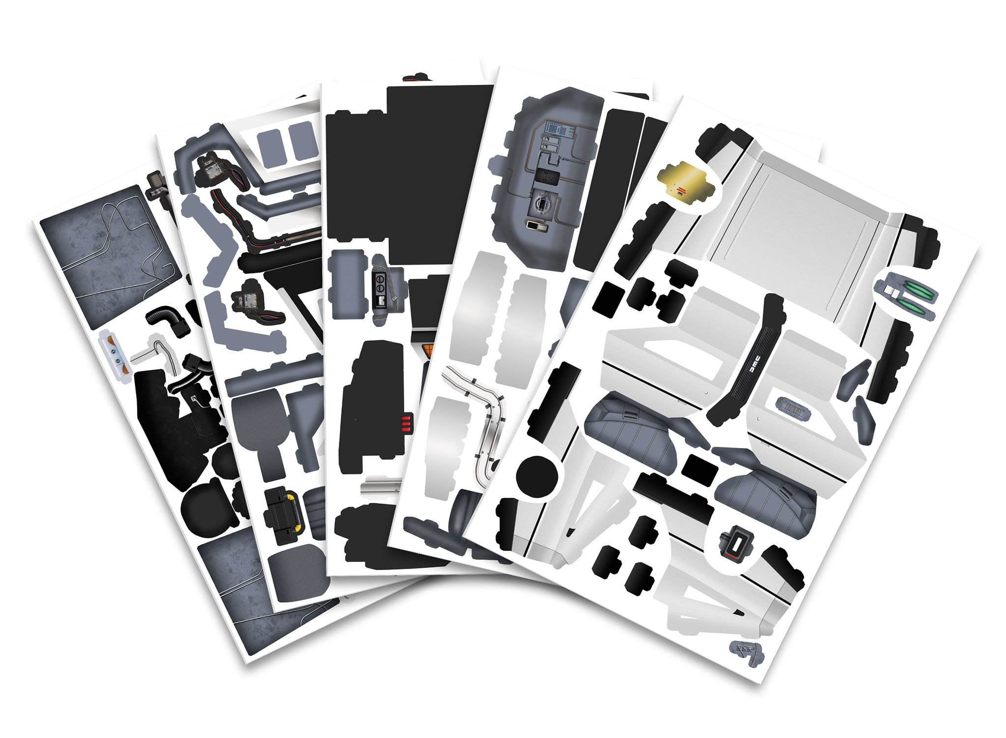 Arkusz papieru z wyciętymi kształtami do modelu. Arkusze mają szare i białe kolory.