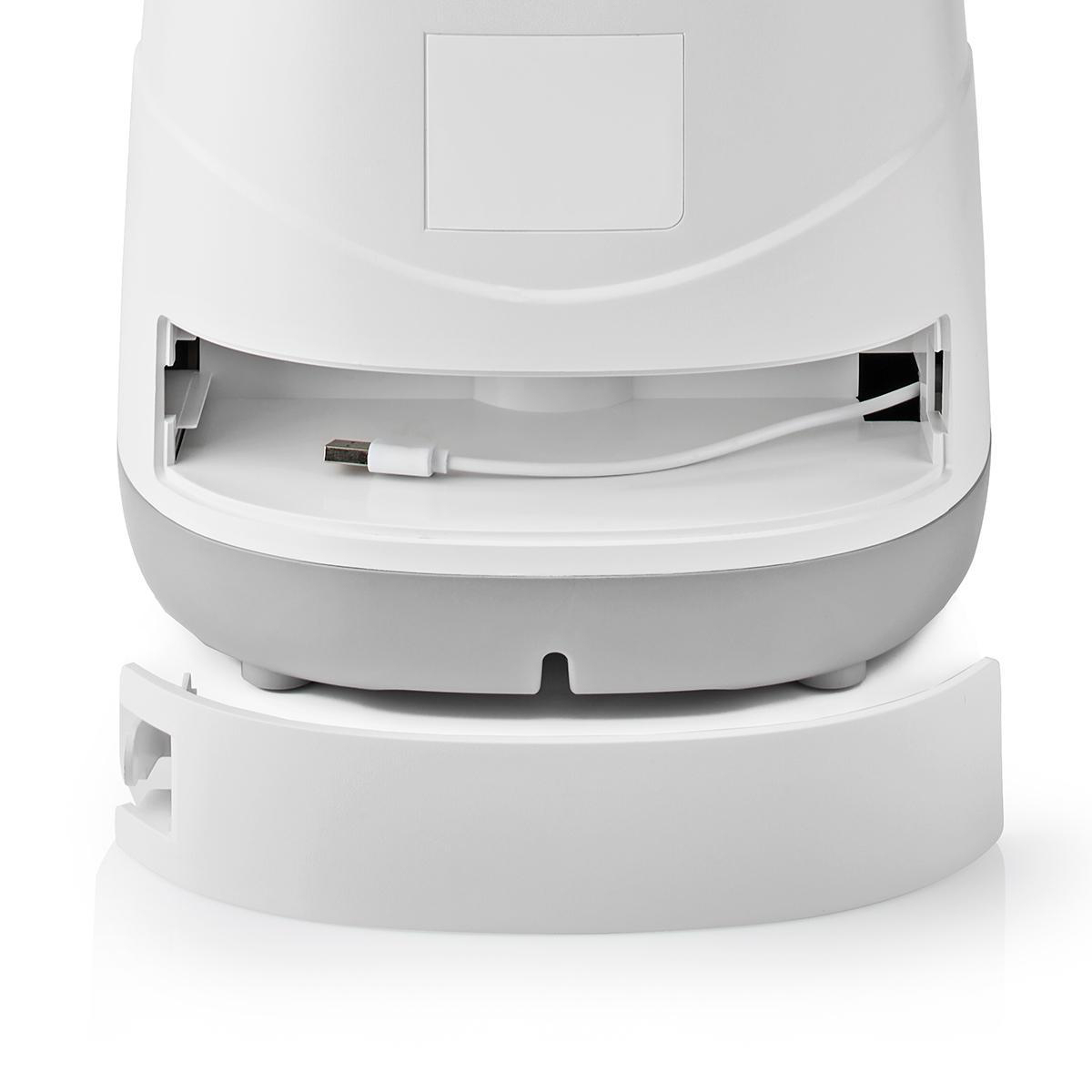 The back of a white and gray device with a USB cable.