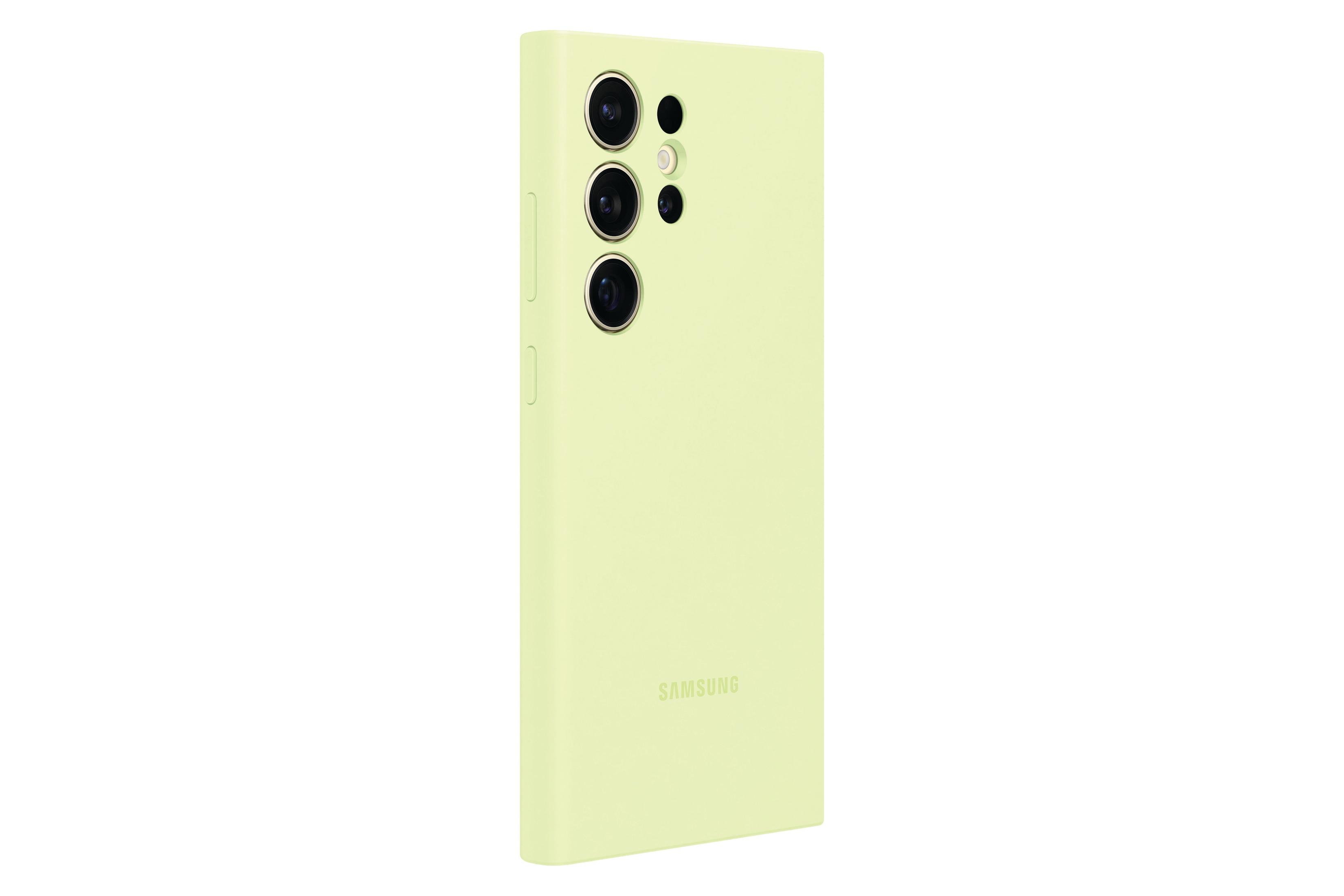 Telefon w limonkowym etui.