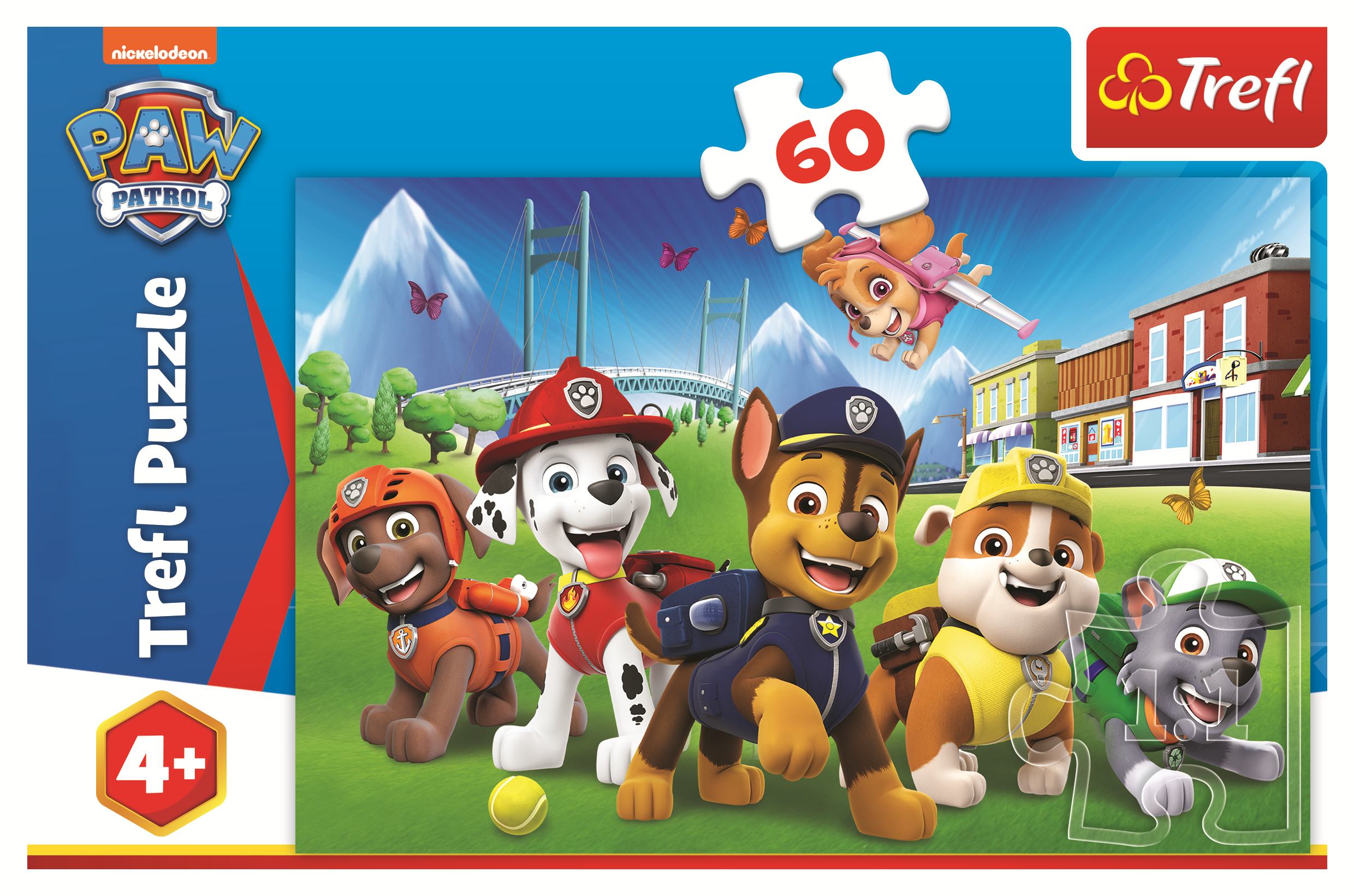 Paw Patrol puzzle. The Paw Patrol characters are shown. The background shows a town with a bridge.