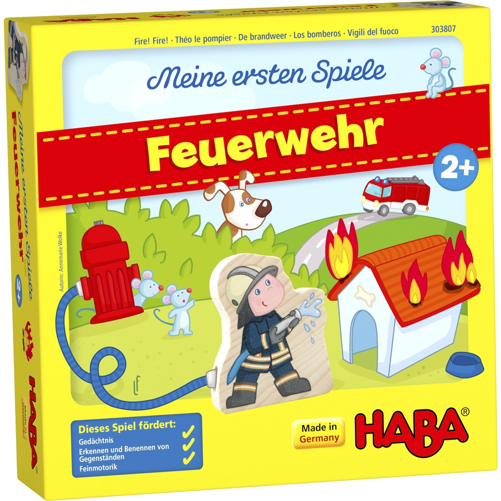 Eine Spielbox mit Feuerwehr-Thema. Sie zeigt einen Feuerwehrmann, einen Hydranten und ein Feuerwehrauto.