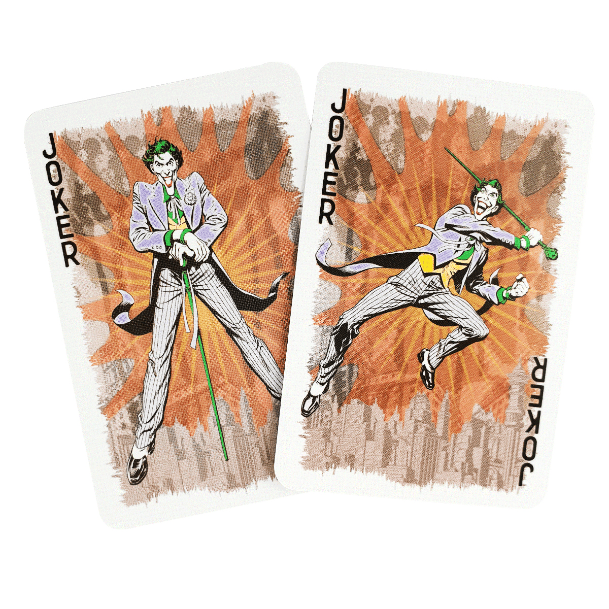 Due carte da gioco Joker con illustrazioni in stile fumetto del Joker su sfondo esplosivo.