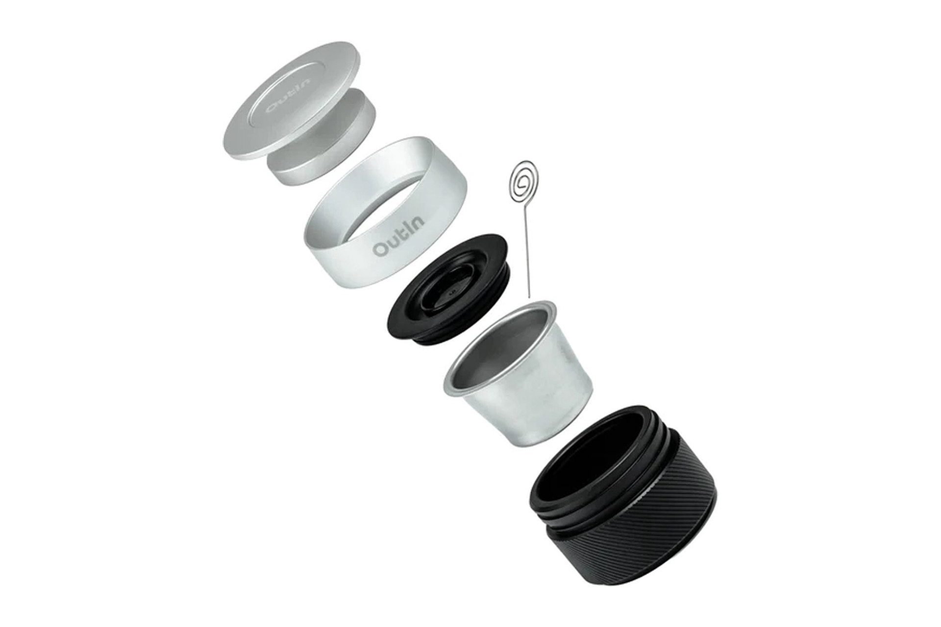 Widok rozłożony na części kapsułki do kawy wielokrotnego użytku z komponentami na białym tle.