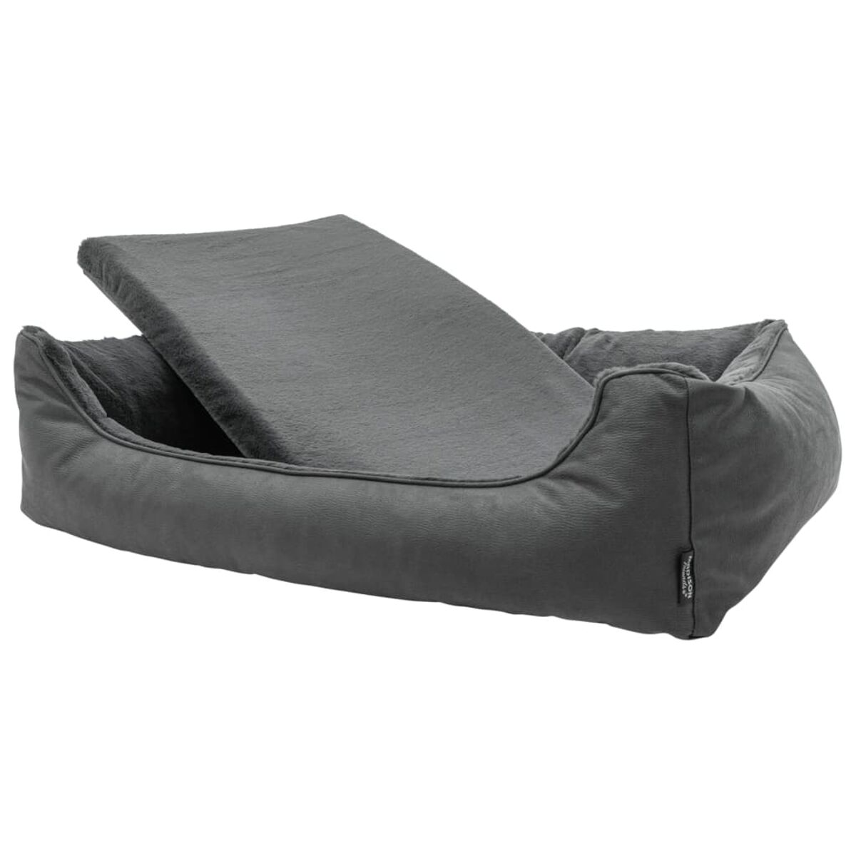 Ein graues Haustierbett mit einem Kissen. Das Bett hat eine gebogene Form.