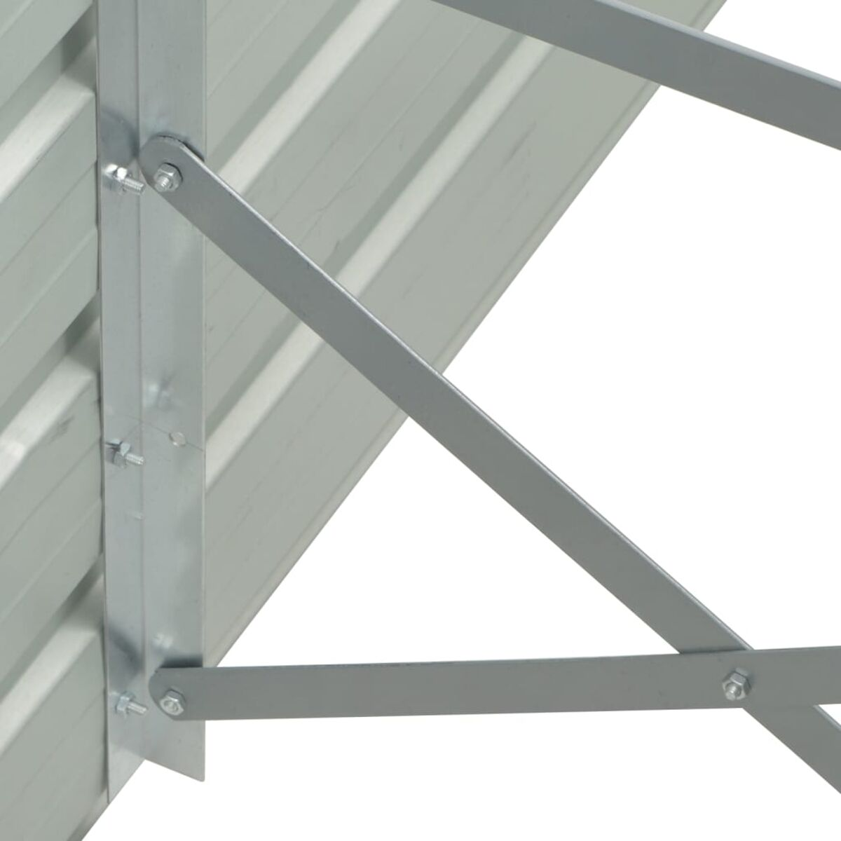 Nahaufnahme einer Metallzaun-Tragkonstruktion. Graues Metall mit Schrauben und Muttern.