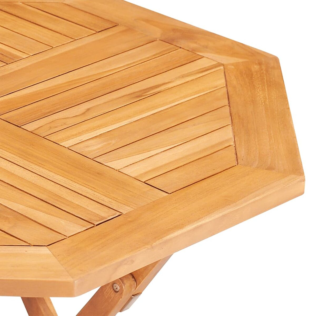 Nahaufnahme der Oberfläche eines Holztisches. Das Holz hat eine hellbraune Farbe.