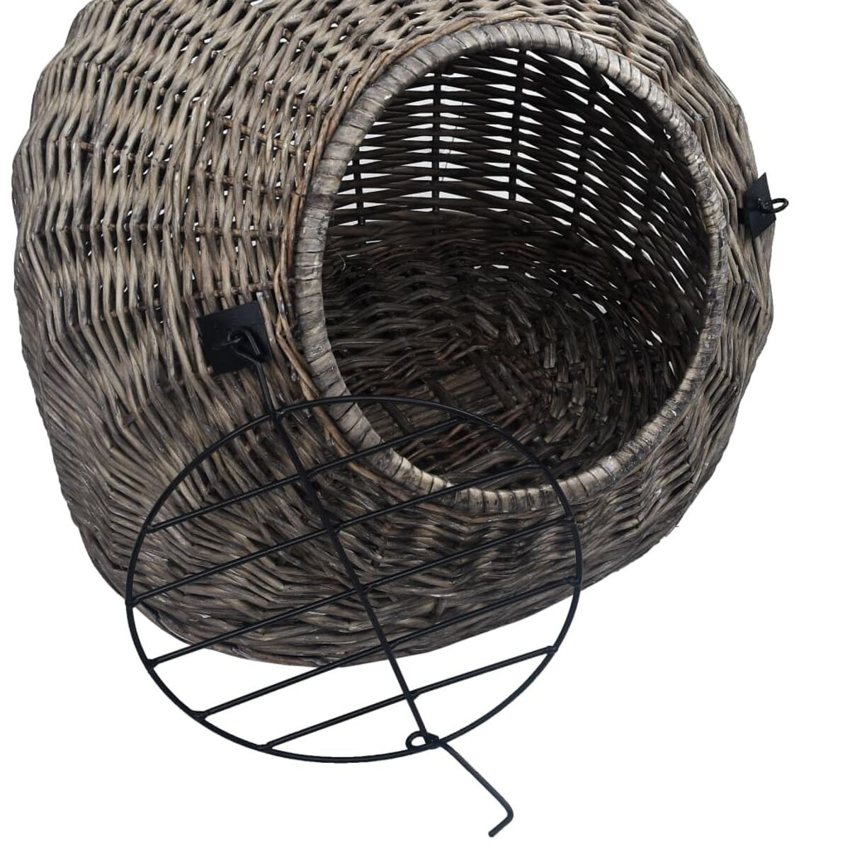 Ein graues Haustierbett aus Weide mit runder Öffnung und abnehmbarem Metallrost.