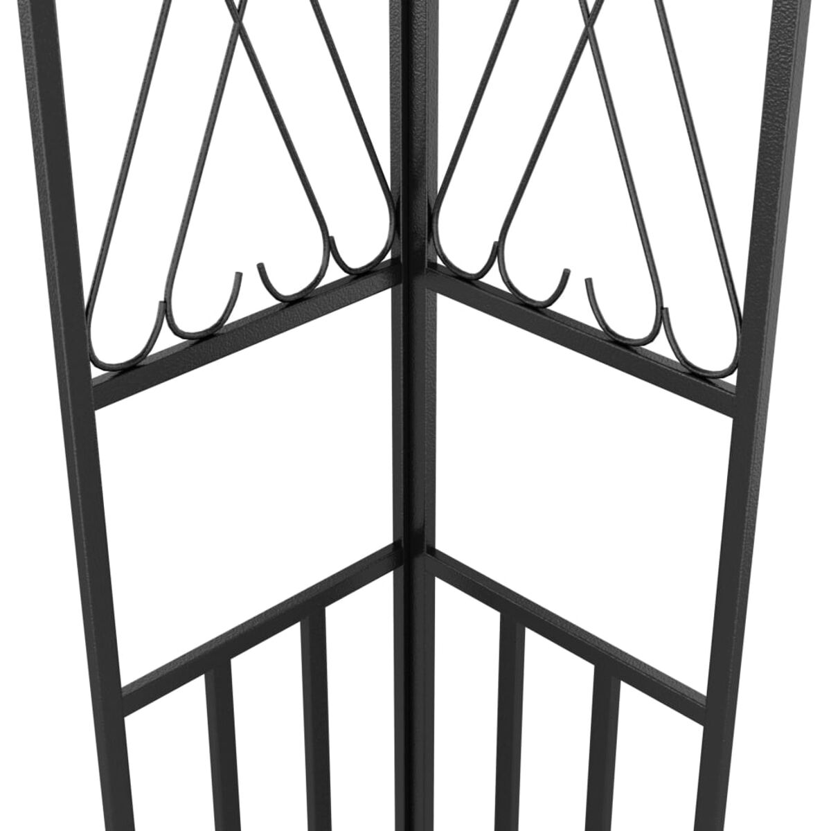 Nahaufnahme einer schwarzen Metallgitterecke. Dekorative Herzformen oben.
