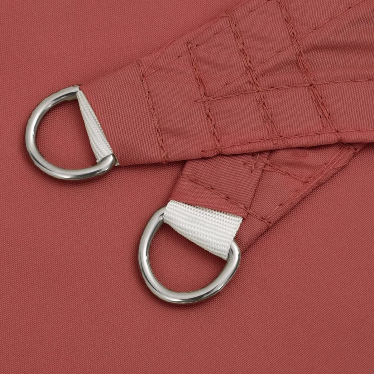 Nahaufnahme von Stoff mit Ringen. Rotbrauner Farbton.