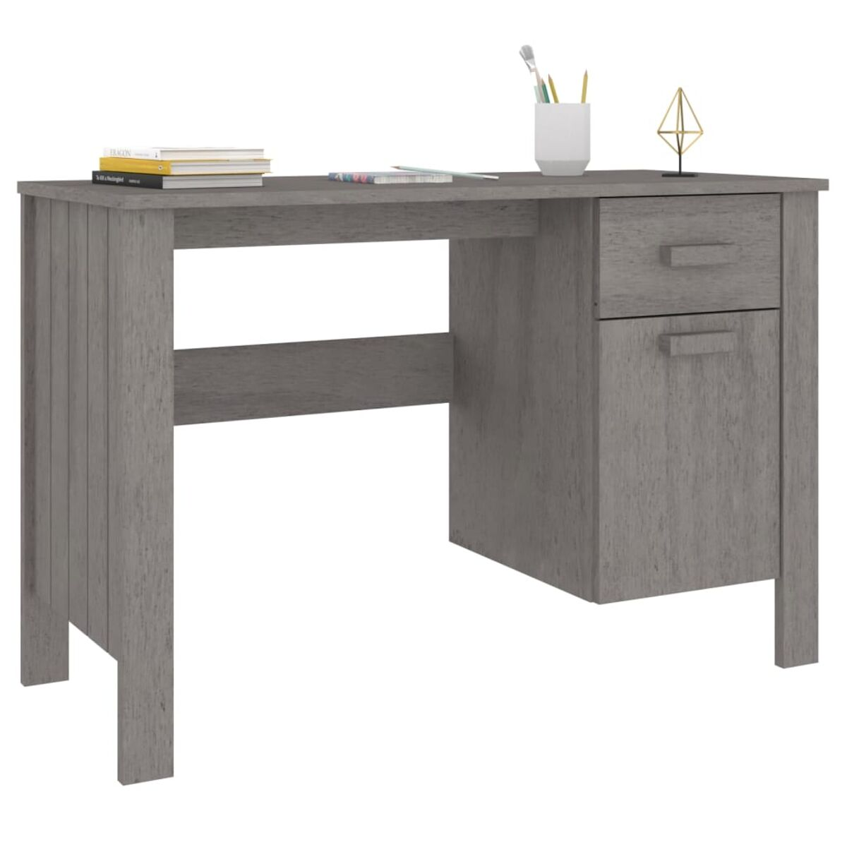 Grauer Schreibtisch mit Schublade und Schrank. Bücher, Stifte und ein goldenes Objekt liegen auf dem Schreibtisch.