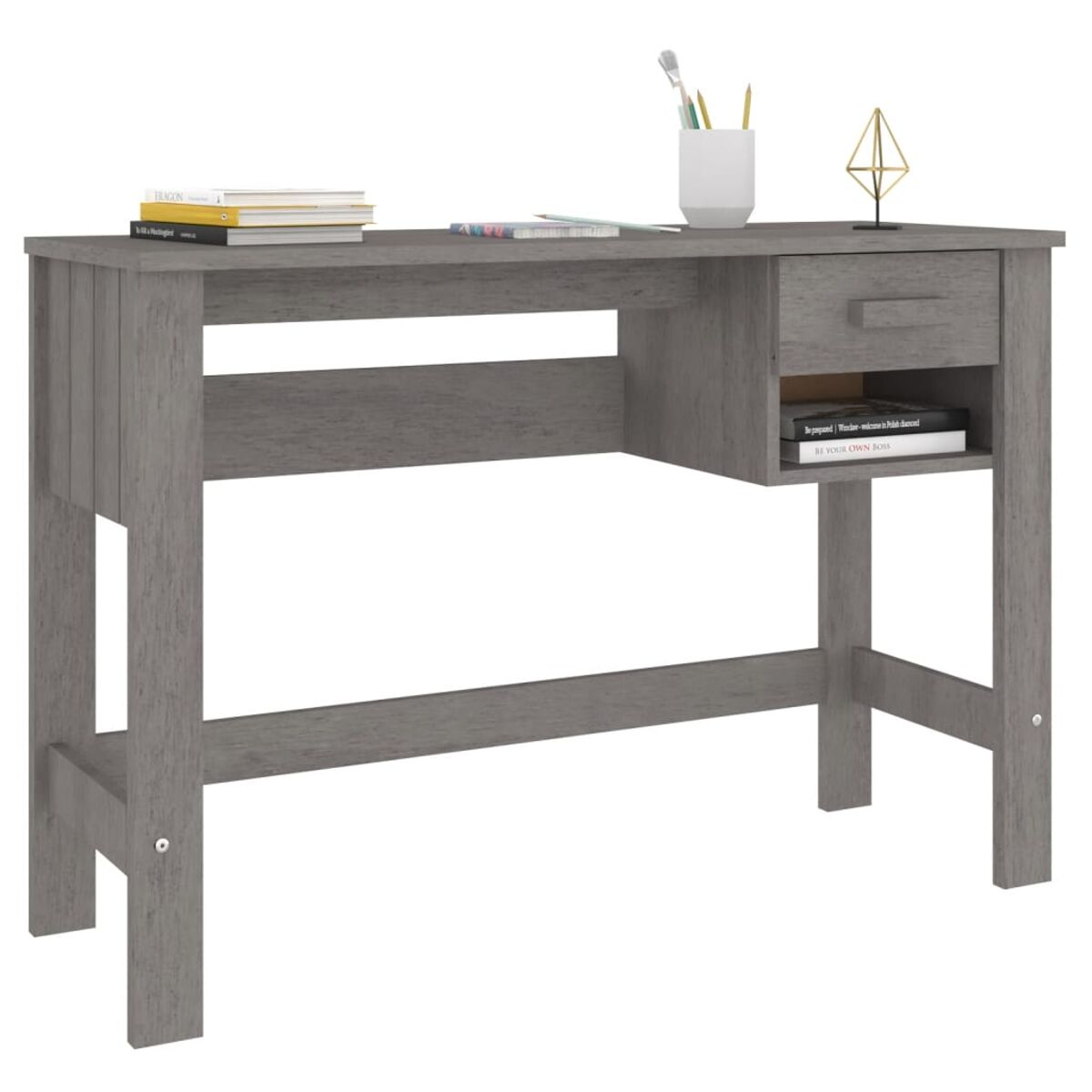 Ein grauer Holzschreibtisch mit Schublade, Büchern und einer weißen Tasse, mit einem Stuhl.