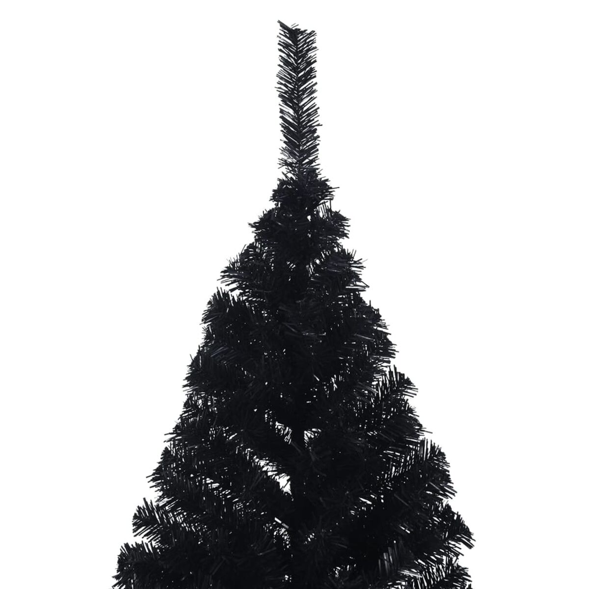 Die Spitze eines schwarzen Weihnachtsbaums. Die Spitzen sind vor weißem Hintergrund sichtbar.