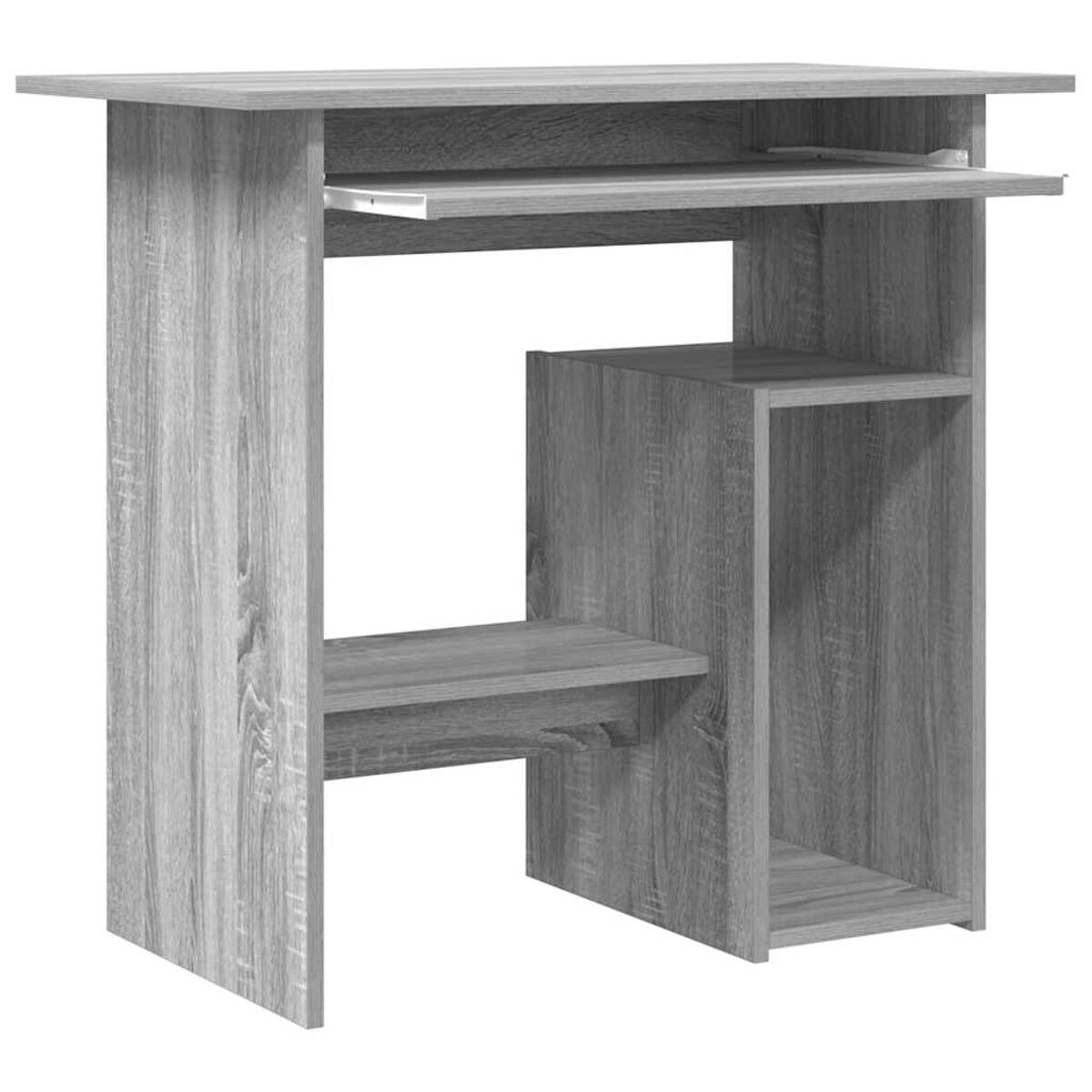 Ein grauer Computertisch aus Holz mit Regal und Tastaturauszug.