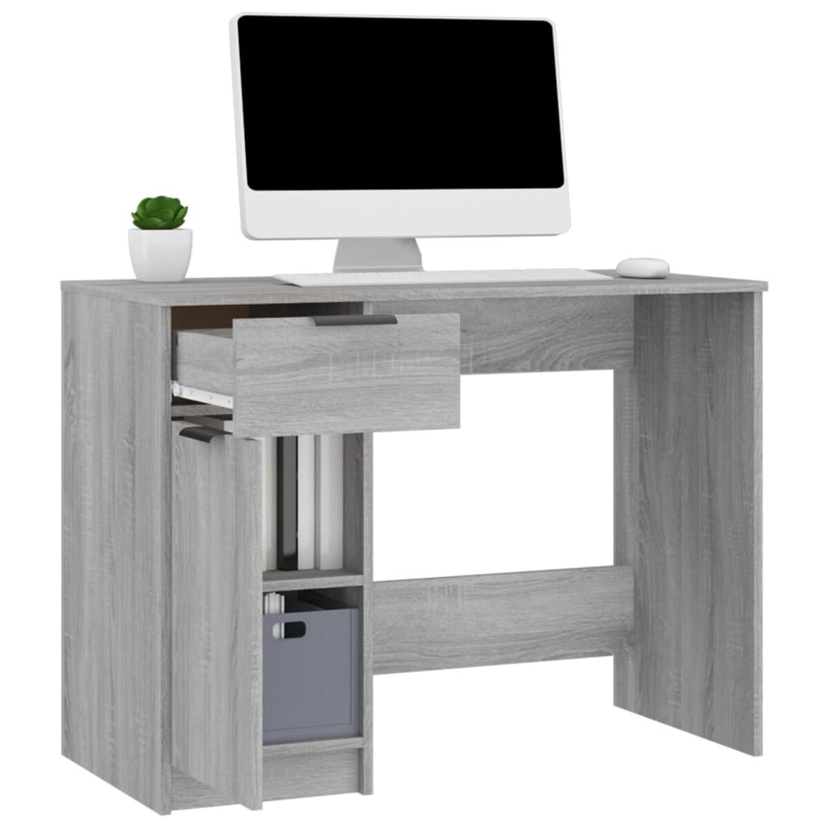 Ein grauer Holzschreibtisch mit Monitor, offener Schublade und kleiner Pflanze. Ein Computer steht da.