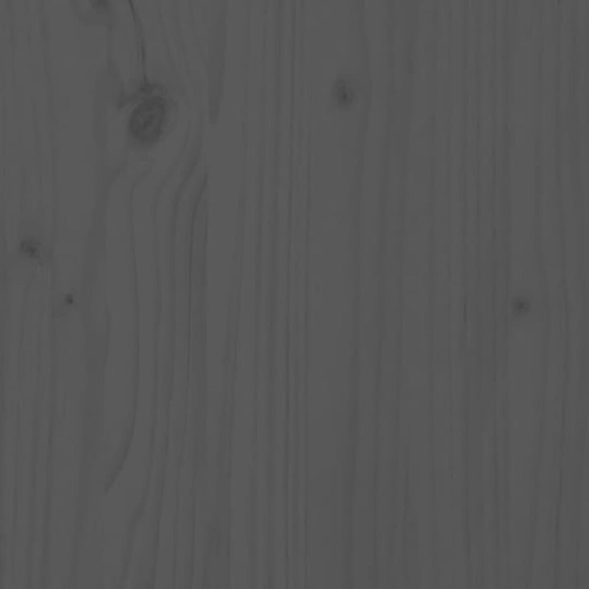 Ein grauer Holzuntergrund. Der Hintergrund ist eine Holzplatte.