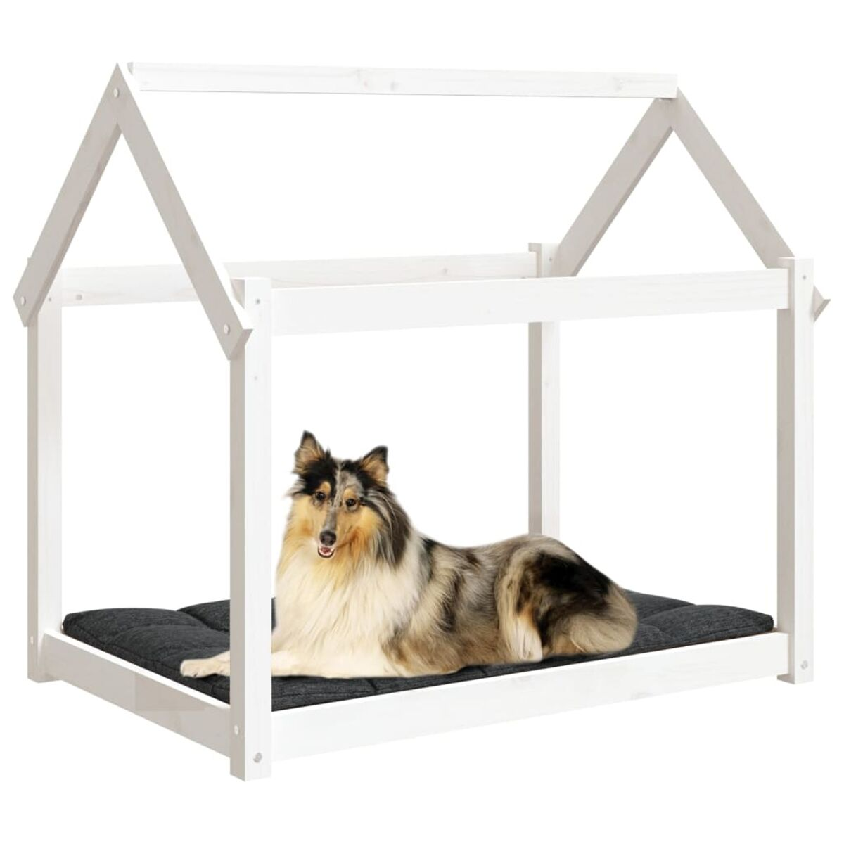 Ein Hundebett in Form eines Hauses, mit einem Hund darauf.