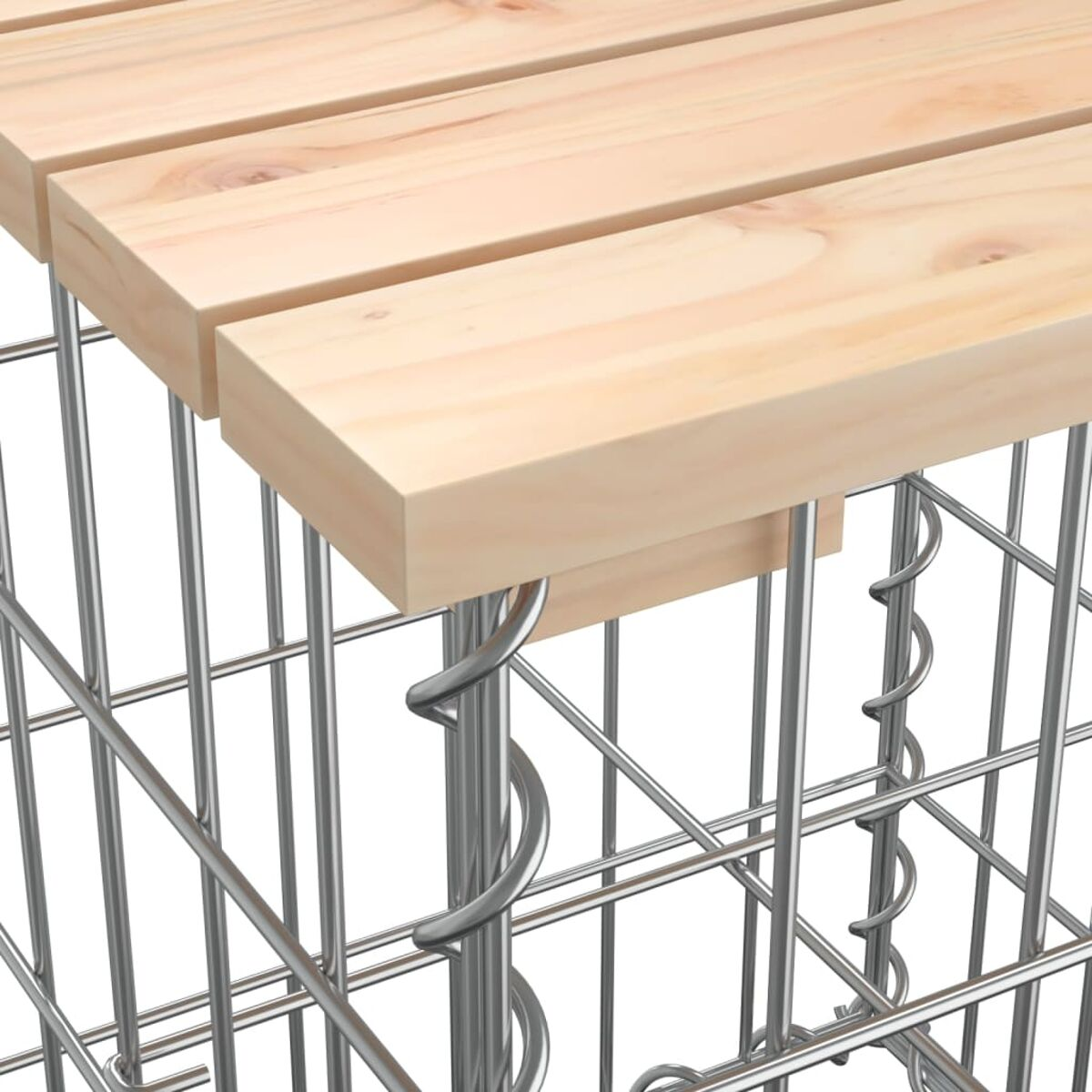 Holzbretter bilden eine Tischplatte. Darunter stützen Metallgitter und Spiralen die Bretter.