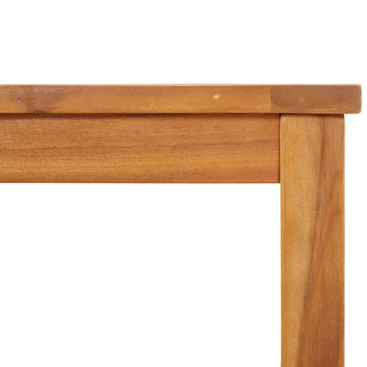Nahaufnahme einer Holztischecke, die die Kante und die Maserung des Holzes zeigt.