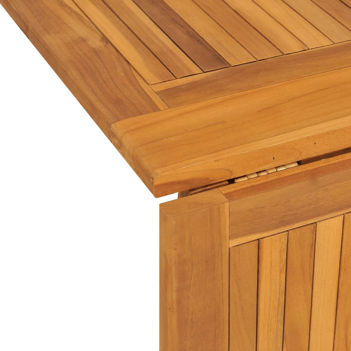 Nahaufnahme einer Holztischecke, die Maserung und die Verbindung des Holzes zeigend.