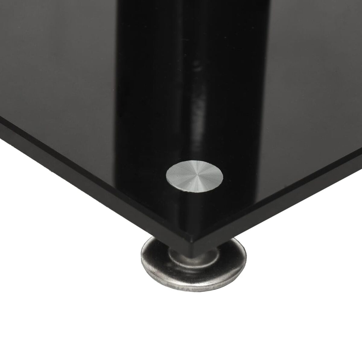 Schwarze Glastischecke mit Metallscheibe und silbernem Sockel.