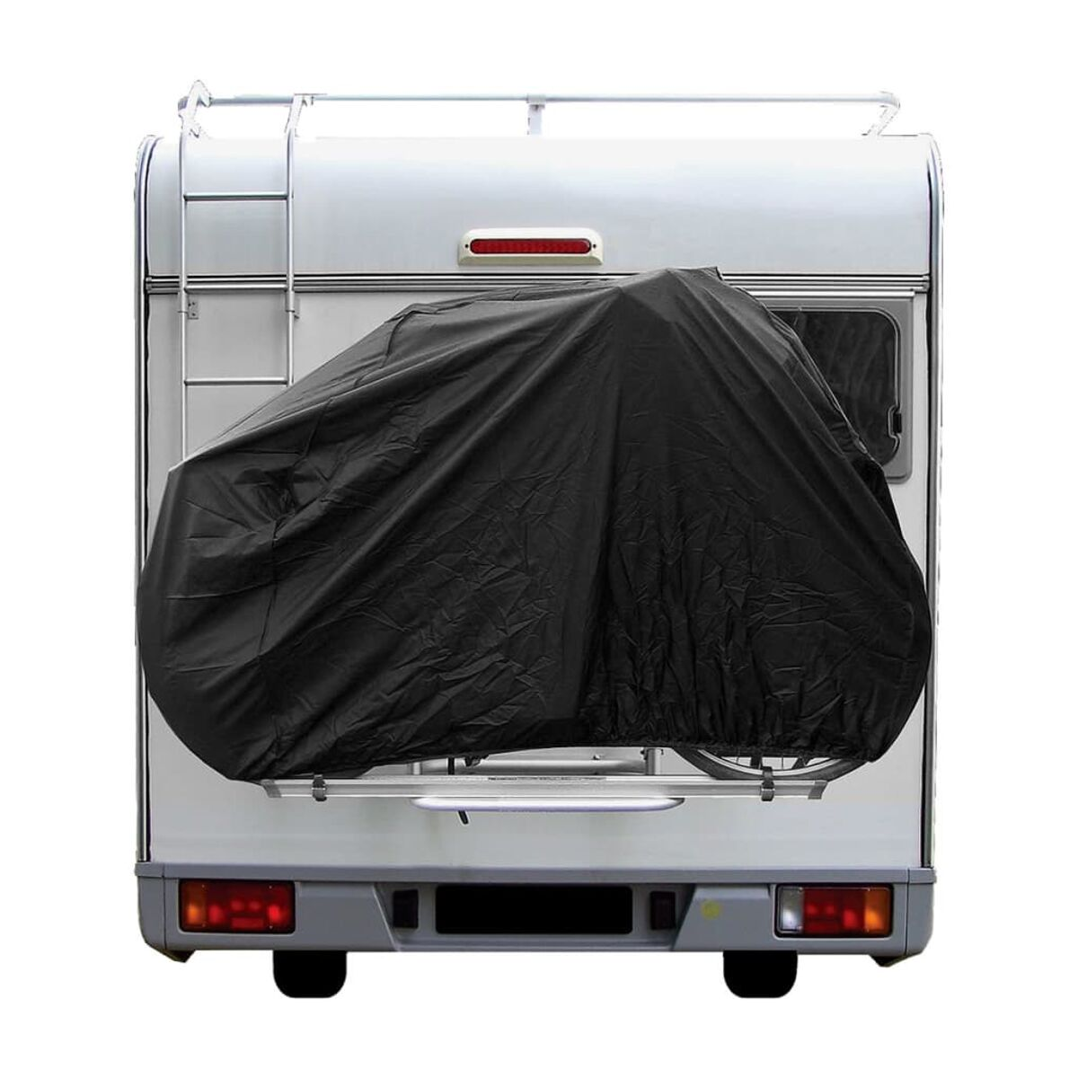 Rückansicht eines Wohnmobils mit schwarzer Abdeckung über den Fahrrädern hinten.