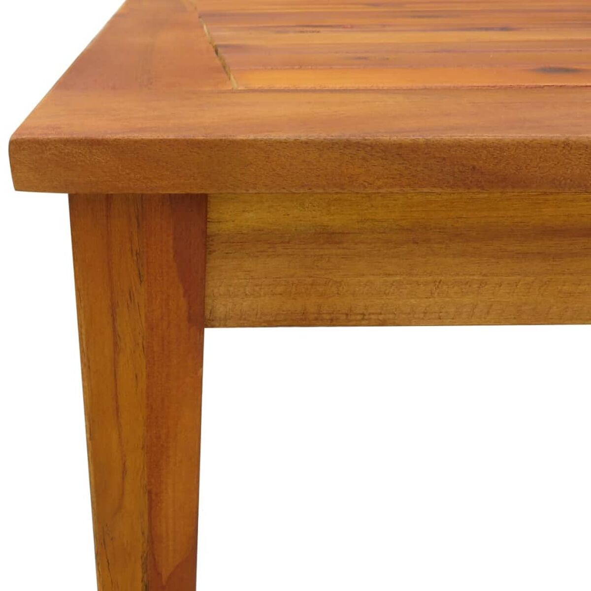 Ecke eines Holztisches, zeigt die Holzmaserung.