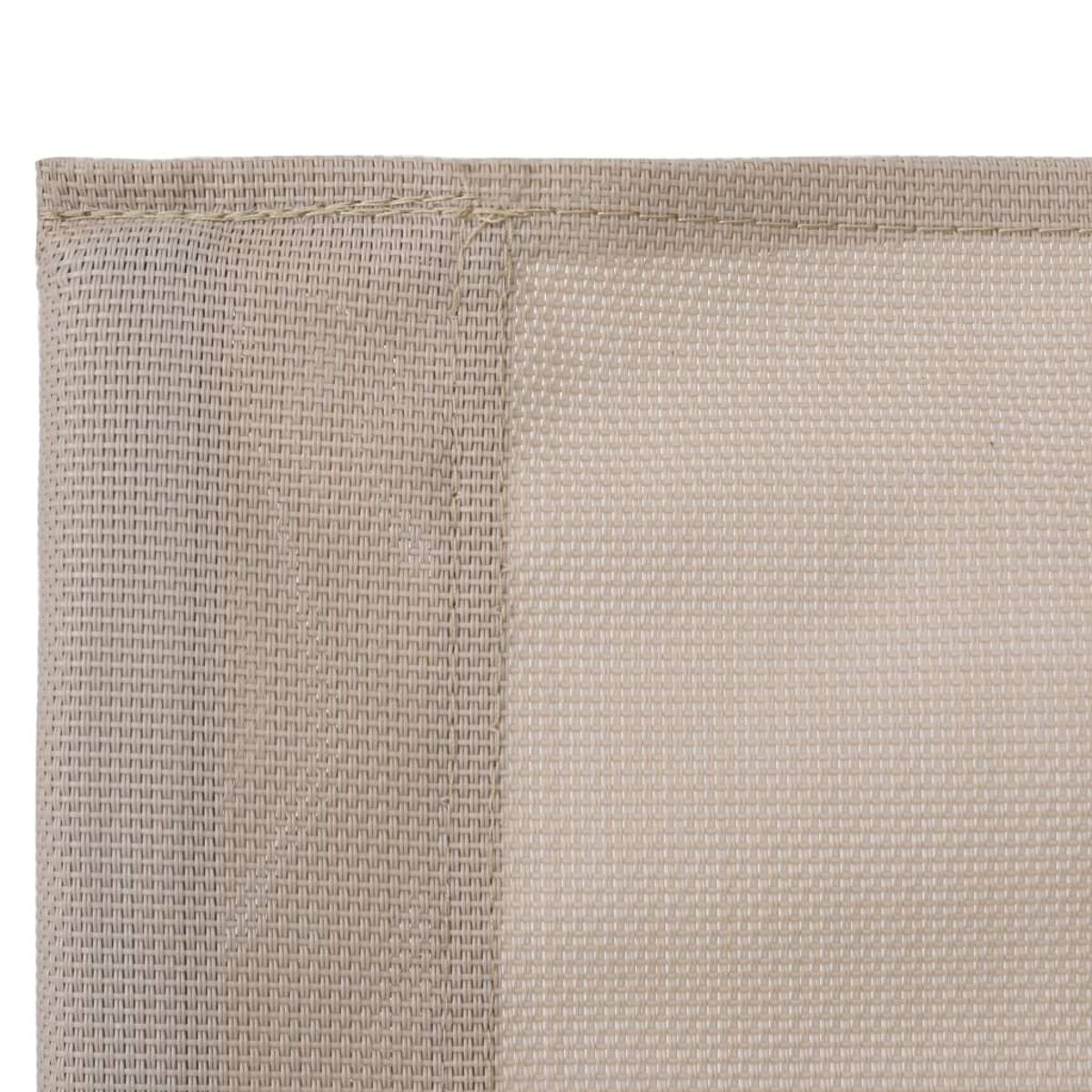 Nahaufnahme eines beigen Textilmaterials mit strukturiertem Muster.