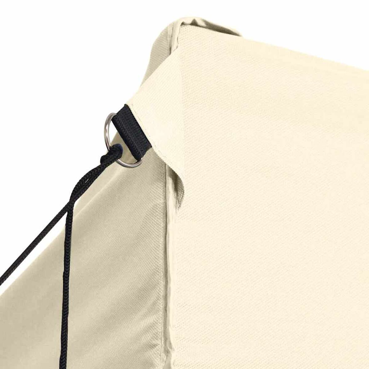 Nahaufnahme eines cremefarbenen Stoffes mit einem schwarzen Seil und Metallringdetail.