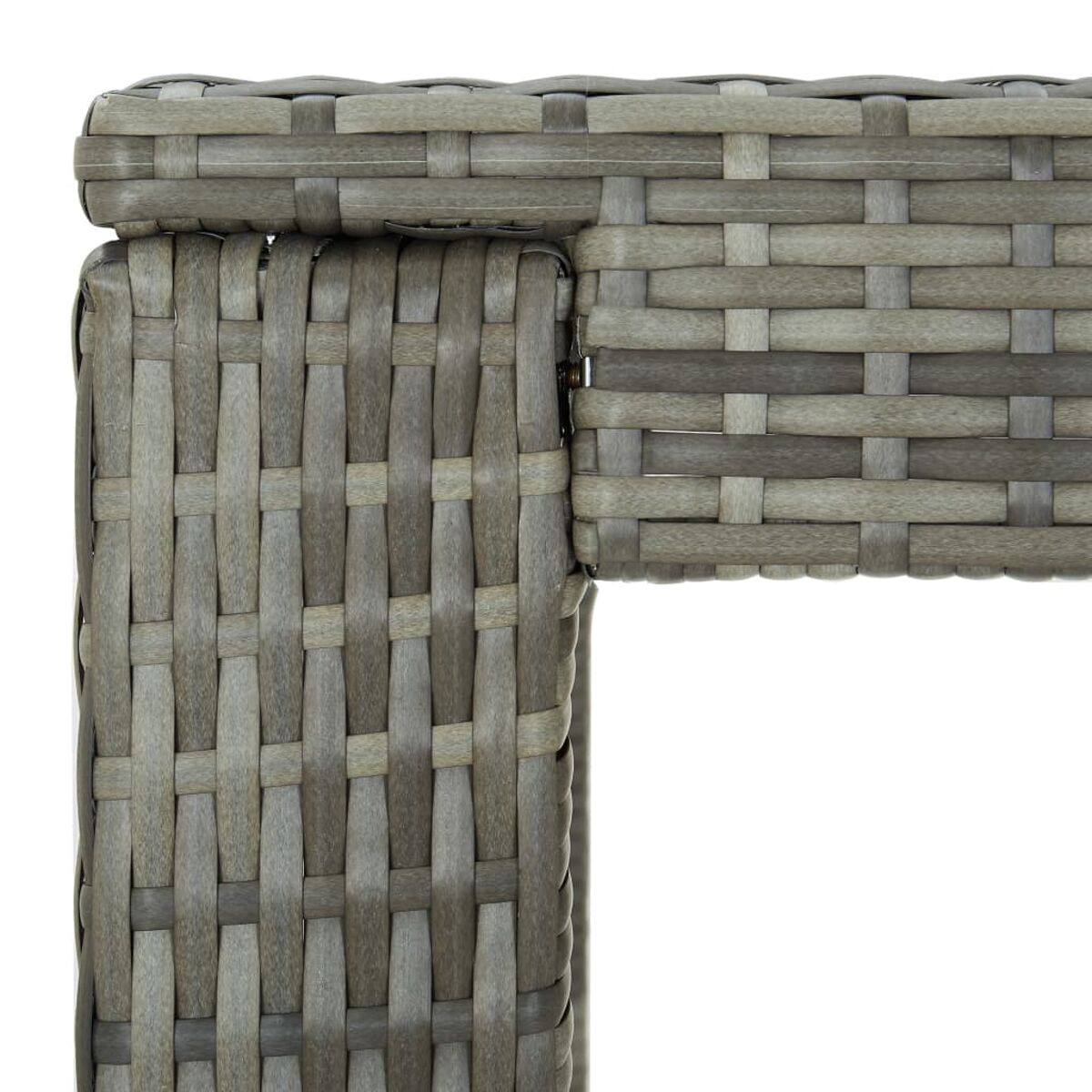 Nahaufnahme von grauem gewebtem Material, das eine Ecke bildet, möglicherweise Korb oder Rattan.
