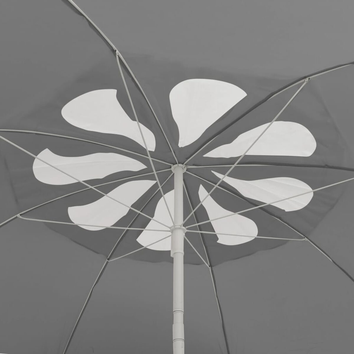 Ein Schirm mit grauem Baldachin und weißem Blumendesign. Er hat einen weißen Mast.