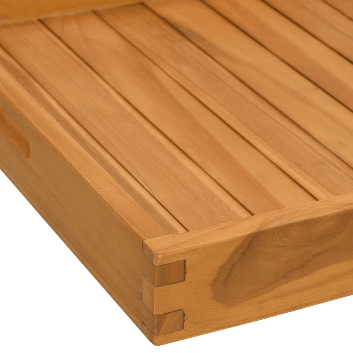 Nahaufnahme einer Holztischecke. Es zeigt die Maserung und die Details der Tischlerei.