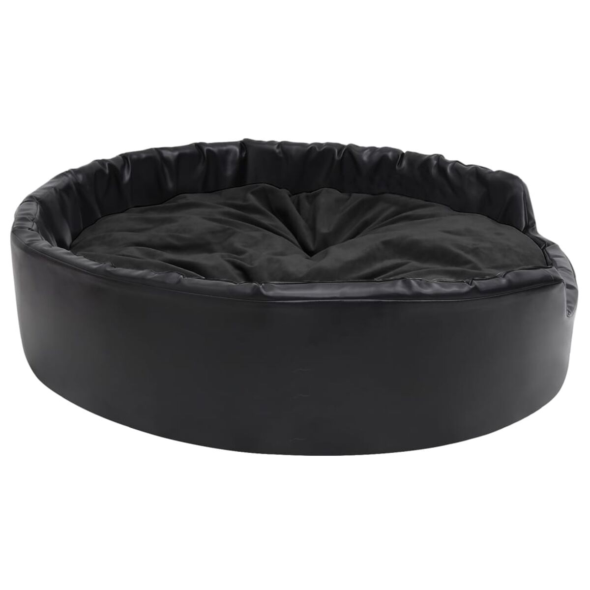 Ein schwarzes Hundebett mit runder Form und einem Kissen im Inneren.