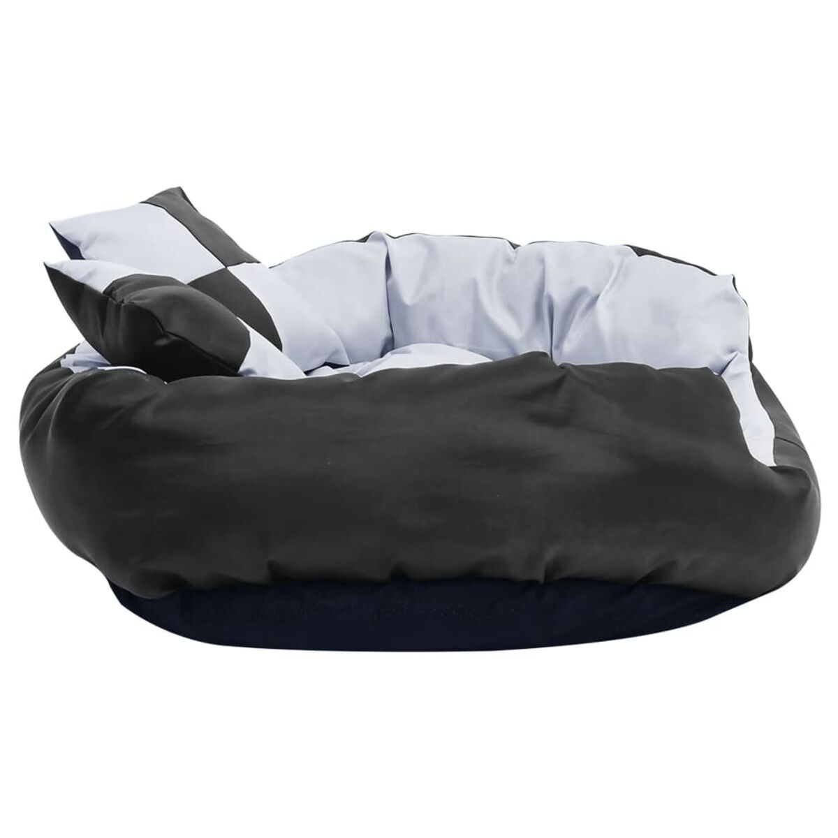 Hundebett mit schwarzem Äußeren und schwarz/weiß gemustertem Kissen und Decke.